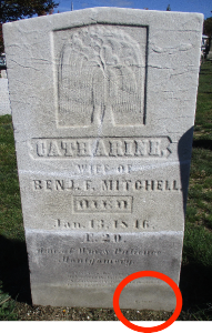 old marble grave marker for Catharine Mitchell with a red circle over the signature area at the bottom