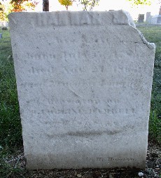 old marble weathered and broken headstone carved for Hannah Damrell