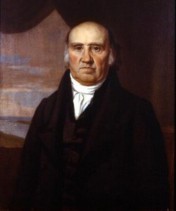 old painting of an old white man in a black robe and high neck white top