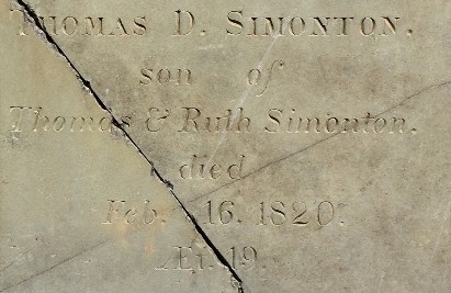 detail of an inscription in a slate grave stone carving