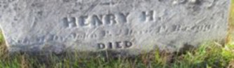 detail from an old marble gravestone inscription: Henry H. Son of Dr. John and Dora F. Briggs, DIED